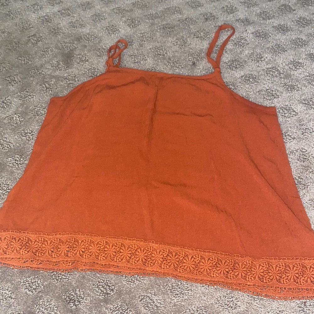 A burnt orange tank top